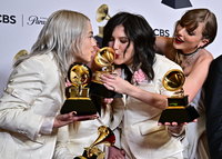 Taylor Swift poses with Julien Baker, Phoebe Bridgers and Lucy Dacus of boygenius after the 66th annual Grammy Awards.