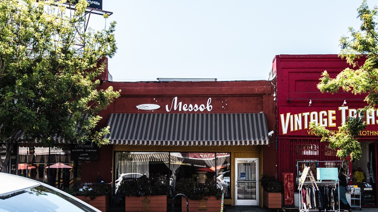 Examining the complex histories, identities, and evolving narratives intersecting across a single block stretch of Fairfax Ave.