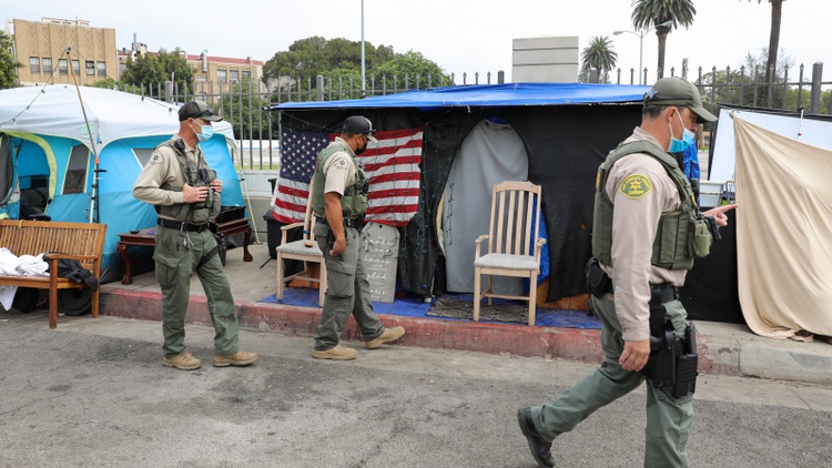 As LA County Sheriff’s deputies try to move homeless veterans to shelters, tragedy strikes the camp, revealing the limits of what law enforcement can really do.