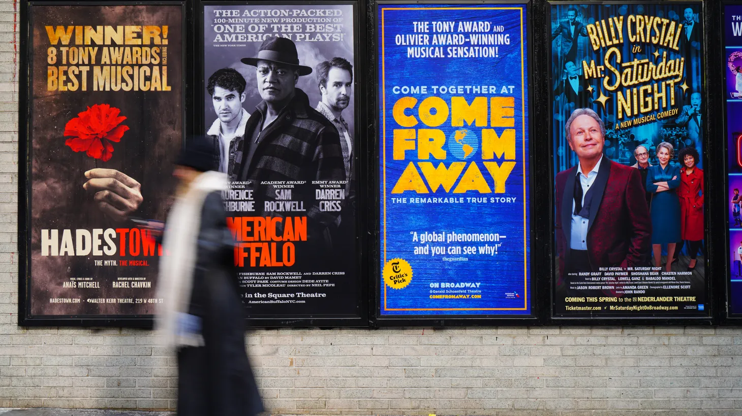 View of posters for Broadway musical shows on a street in New York City on February 20, 2022.